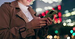 Woman, hands and outdoor with texting on smartphone on smile at night for conversation on social media in New York. Female person, happy and text message for networking or communication on mobile app