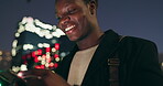 Night, smile and black man with smartphone in city for communication, social media or networking. Online, contact and happy man with mobile phone for connection, notification or searching internet