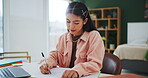 Student, hands and writing in book for study, university and school exam or quiz in house. Girl, closeup and memory notes on paper with learning or knowledge for college, scholarship in home bedroom