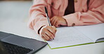 Woman, hands and writing for study, university and school quiz in house with book. Student, closeup and memory notes on paper with learning or knowledge for college, scholarship in home bedroom