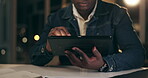 Tablet, black man and working at night in office with business analytics for company with tech. Planning, trading or finance with broker for overtime on internet or searching app with trader.