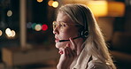 Virtual assistant, headset and woman agent in office at night for technical support surveillance duty. Programming, late and female police cyber security consultant working on computer for overtime.