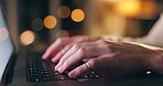 Hands, laptop and typing with business employee in office at night for report, research or review. Computer, information and internet with person closeup at desk in workplace for evening deadline