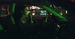 Happy woman, driving and dancing with car at night for music in cruise, transportation or commute. Female person or driver in relax or enjoying late evening in vehicle for fun travel in an urban town