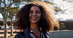 Turn, outdoor and black woman with smile, face and wind on hair, confidence and haircare for employee. Bokeh, happiness and person with band for hairstyle, breeze and air on hairdo of model in Brazil