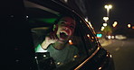 Woman, car window and happy with pointing on road with smartphone for social media, texting and networking in New York. Female passenger, taxi and smile at night with chat for online communication