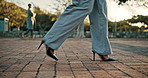 Business, woman and legs with travel in park for corporate, career or morning journey to work. Sunrise, high heels and professional person with walking in nature for company, job or commute in Boston