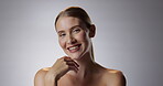 Woman, smile and portrait on gray background for wellness with beauty in confidence for self esteem. Aesthetic, pride and skincare in studio for makeup with face or routine in London with happiness.