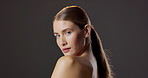 Confidence, skincare and face of woman in studio with natural beauty, mockup and luxury cosmetics. Dermatology, facial care and portrait of girl with glow, makeup and healthy skin on dark background.
