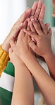 Teacher, hands and high five with students for teamwork, unity or collaboration together at school. Closeup or group of people touching in community for solidarity, youth or childhood development