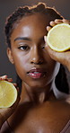 Lemon, beauty and portrait of black woman with skincare for natural vitamin c, benefits and cosmetics in studio. Dermatology, fruit and girl with facial care, glow and healthy skin on dark background