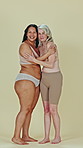 Women, body positivity and inclusion for diversity, happy and empowerment for self love, natural and studio. Portrait, hug and smile for underwear, solidarity or inclusivity for weight acceptance