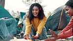 Friends, happy and camping fire in nature, smile group and holiday or vacation with conversation. Bonfire, adventure and bonding together in outdoor, relax and campsite for warm or picnic in park