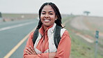 Road, hiking and portrait of black woman with arms crossed for journey, safety or immigration. Smile, travel and person with backpack for freedom, flee war or waiting for lift on highway in Germany