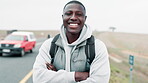Smile, arms crossed and face of black man with backpack by road for travel, adventure or holiday. Cars, person and happy at countryside with pride for outdoor trekking, vacation or tourism in Nigeria
