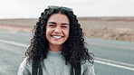 Road, hiking and portrait of woman in countryside for journey, safety or immigration. Smile, travel and person with backpack for safe destination, flee war or waiting for lift on highway in Germany