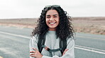 Road, hiking and portrait of woman with arms crossed for journey, safety or immigration. Smile, travel and person with backpack for freedom, flee war or waiting for lift on highway in Germany