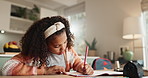 Girl, homework and book in kitchen with writing for child development or responsible with learning. Growth, studying and critical thinking at table for english class with knowledge for project.