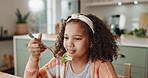 Young, girl and kitchen for tasting broccoli or food, dinner or lunch with healthy nutrition. Female child, vegetable and eating at table in home for wellness, diet with taste test or fork for meal