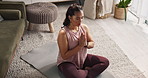 Yoga, zen and breathe work for woman in lounge, floor and meditation in living room of home. Peace, prayer hands and wellness or balance for spiritual female person, holistic and exercise in house