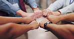 Business people, hands and fist bump with team for meeting, collaboration or mission together at warehouse. Closeup, group or employees in unity for community, engagement or synergy at storage depot