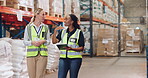 Warehouse, woman and planning with tablet or discussion, inspection and construction team or conversation. Brainstorming, development and online inventory for project, storage depot and contractor