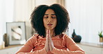 Home, yoga and meditation with prayer hands of woman for peace, relax and spiritual wellness or health. Apartment, female yogi and namaste pose for mindfulness, chakra and zen by girl in house