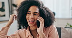 Happy, black woman and laughing with phone call on sofa for friendly conversation or fun chat in living room. African or female person with smile on mobile smartphone for funny discussion at home