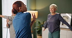 Fitness, stretching or yoga with coach and old people in assisted living apartment for wellness. Community, exercise or workout with instructor and senior group in retirement home for mobility