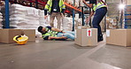 Accident, warehouse and employees helping man with leg pain for working with heavy cardboard boxes. Ecommerce, freight and factory worker on floor with muscle sprain and medical emergency with team.