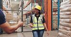 Happy black woman, engineer and greeting at warehouse with colleagues for shipping, logistics or storage. Excited African, female person or contractor walking in depot with employees for teamwork