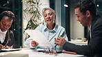 Business people, paperwork and audit discussion in office at night for overtime financial review meeting. Corporate team, accountant and project management with document for erp and budget deadline