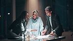 Night, people and discussion in office with documents for teamwork, collaboration and deadline as accountant. Employee, business and meeting for financial reviews, records and auditing with report