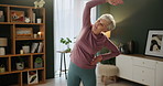 Senior woman, stretching and exercise for fitness, health in physiotherapy at rehabilitation clinic. Pensioner, training and sports at nursing home in lounge for strong muscles, wellness and routine