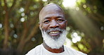 Senior black man, fitness and face in park with smile for training, health or progress to lose weight. African person, runner and happy in portrait for exercise, workout or wellness on path in garden