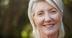 Portrait, nature and senior woman with fitness, smile and exercise for wellness, workout and training. Runner, athlete and mature lady with happy, outdoor and ready for trail, relaxation and break
