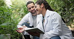 Greenhouse, talking and scientist with tablet for plant research, agriculture and cannabis inspection. Teamwork, biologist or clipboard with lab coat, production check or indica growth sustainability