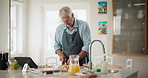 Portrait, cooking or senior man in kitchen with healthy food for nutrition, wellness or retirement at home. Vegan diet, cutting vegetables or mature person in house in preparation for dinner meal