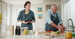 Cooking class, tablet and chef with elderly man in kitchen for online recipe, instructions and learning. Teaching, nutritionist and senior person for ingredients, steps and culinary course in home