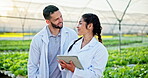 Scientist, agriculture and tablet for botany in greenhouse for experiment, research or development. Woman, man and tech in field for discovery of plants for innovation in pharmaceuticals or medicine