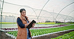 Writing, clipboard and girl farmer in greenhouse for plant growth inspection, note or checklist in nature. Agriculture, sustainability or proud agro manager with botany documents, leaf or inventory