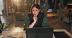 Thinking, laptop and woman in night office with documents for accounting, solution and planning, budget or investment choice. Why, idea and accountant with questions of economy, inflation or trading