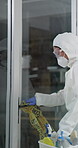 Crime scene, tape and cleaning team for forensic, disinfectant and research for analyse. PPE, suit and protection for scientist and expert person, mask and equipment for disinfection and analysis
