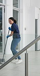 Happy, woman or housekeeper mopping and dancing and while cleaning floors for hygiene and health at home. Smile, woman and rhythmic moves for housework, disinfectant and dust control in kitchen