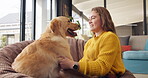 Woman, dog and pet in home for love, affection and trust or support in living room. Puppy, training and Golden retriever for adoption or rescue for animal, owner person and hug and canine best friend