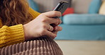 Home, hands and woman with smartphone, typing and internet for social media, connection and texting. Closeup, person and girl in apartment, cellphone and mobile user with contact and website info