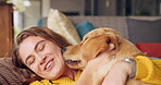 Woman, dog and pet in home for love, affection and trust or support in living room. Puppy, training and Golden retriever for adoption or rescue for animal, owner person and hug and canine best friend