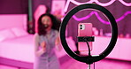 Girl, dancer and ring light for live stream for social media, connection or audience for online. Female person, influencer and bedroom with tripod for video, content creation and tech at home for app