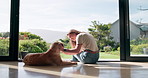 Happy, woman and dog on floor in home for friendship, bonding and love with care and smile. Female person, pet and animal owner with playing for fun, relax and enjoy for welfare and adoption