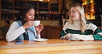 Women, coffee and conversation in cafe as friends with chat, happy and gossip news for social connect. Girls, latte and communication in New York restaurant in morning for advice, relax and talking